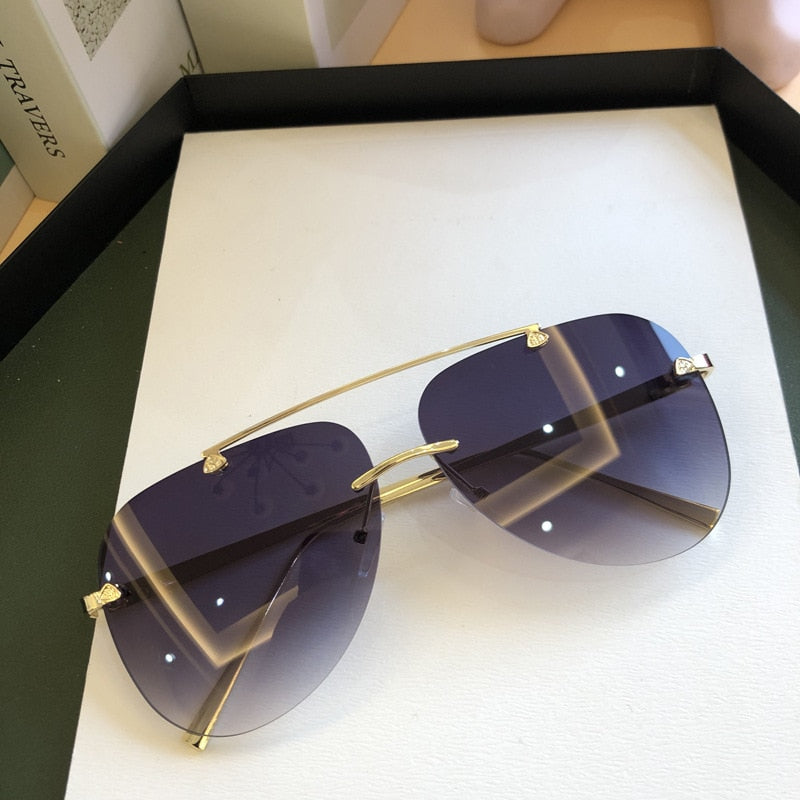 2021   Luxury  Designer Fashion Oval Rimless SunglassesSummer Glasses Fashion Sun glasses For Men Women UV400 Sunglasses