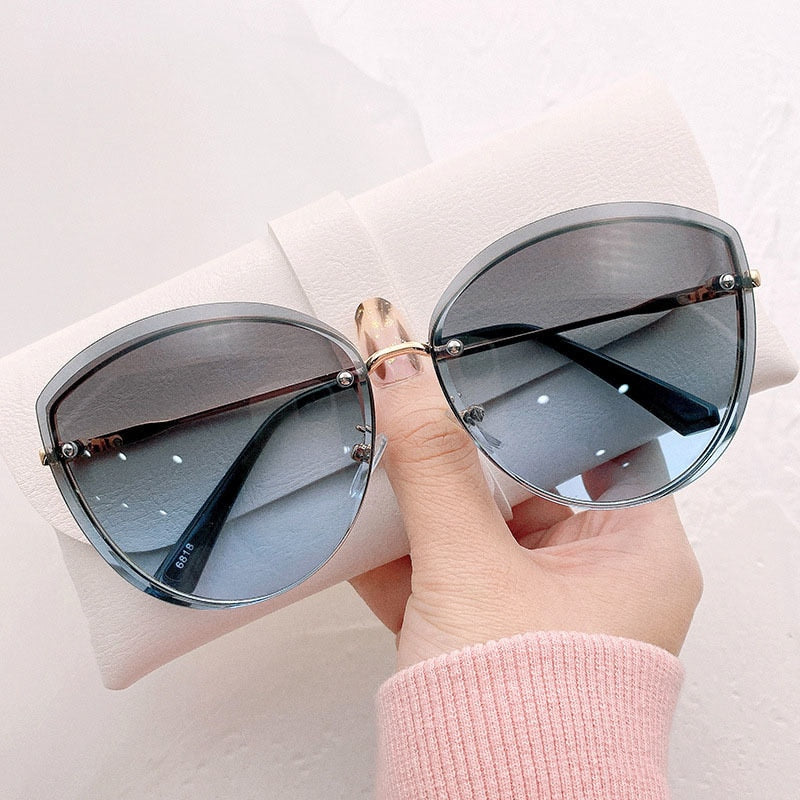 High Quality women's Oval Rimless Sunglasses Lady Metal Cay Eye Shades for Women Driving Glasses Sonnenbrille zonnebril dames