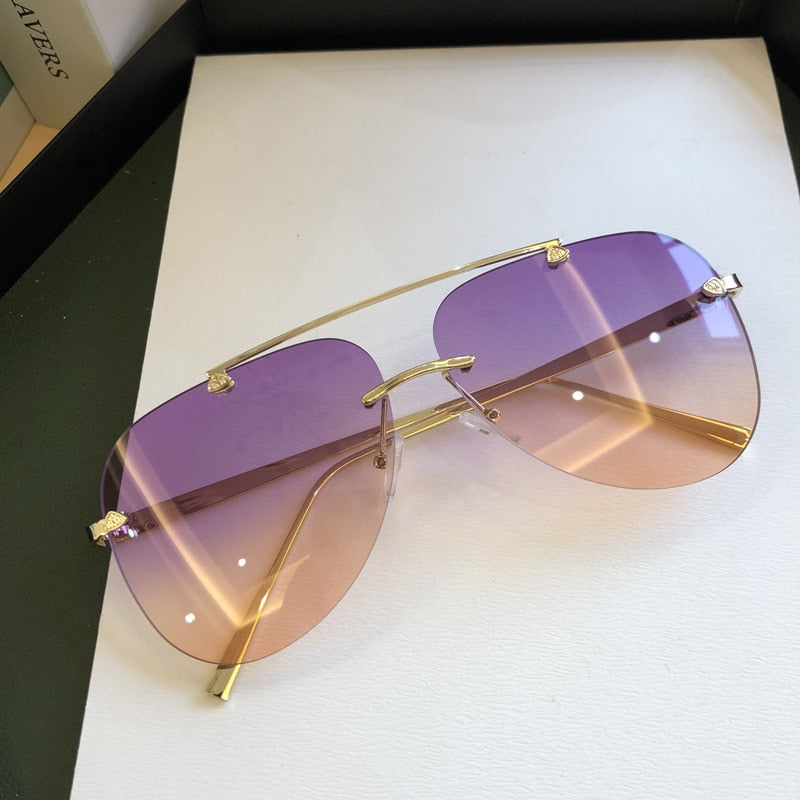 2021   Luxury  Designer Fashion Oval Rimless SunglassesSummer Glasses Fashion Sun glasses For Men Women UV400 Sunglasses